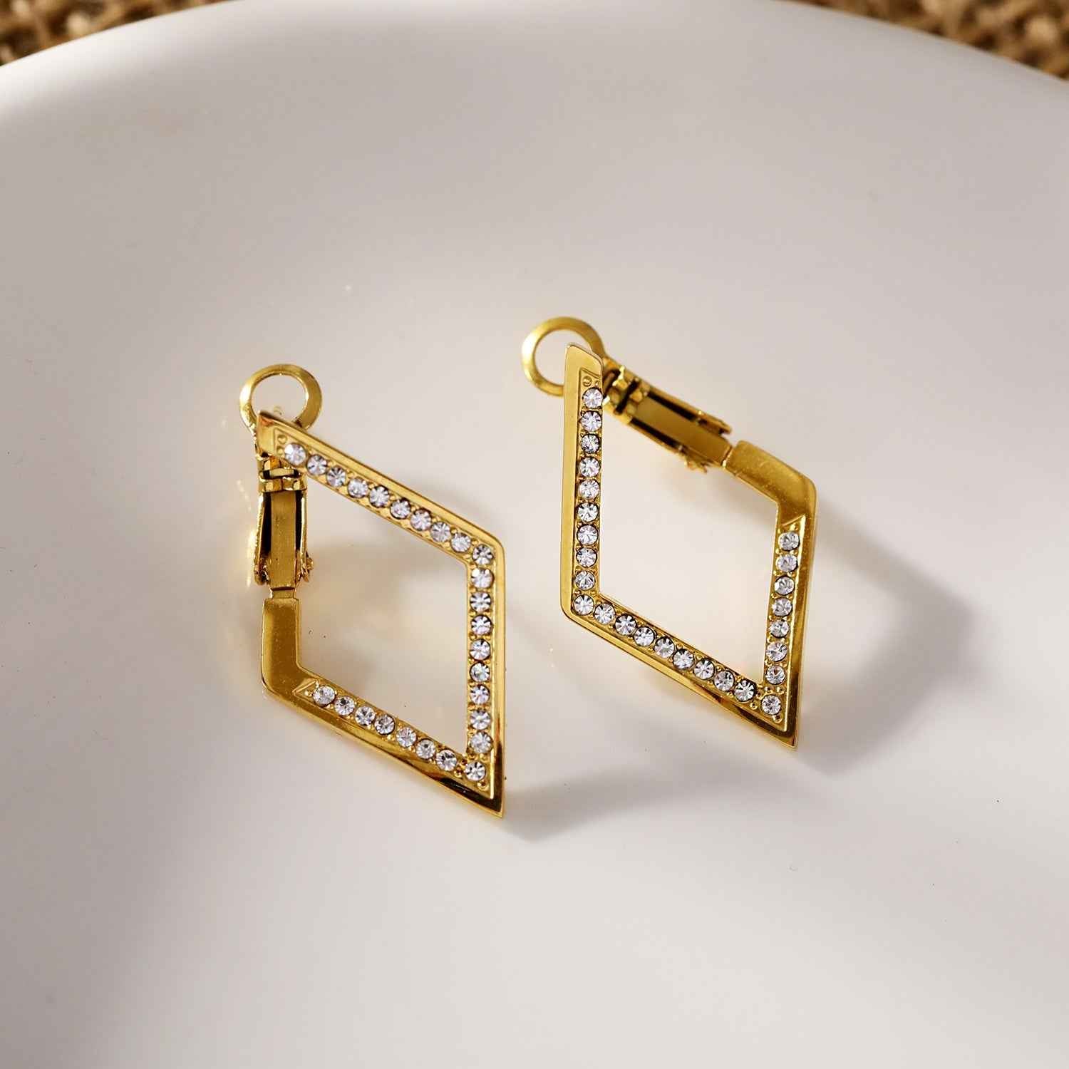 ALMA: Twisted Diamond Shaped Hoop Earrings Embedded with Zirconia Gemstones