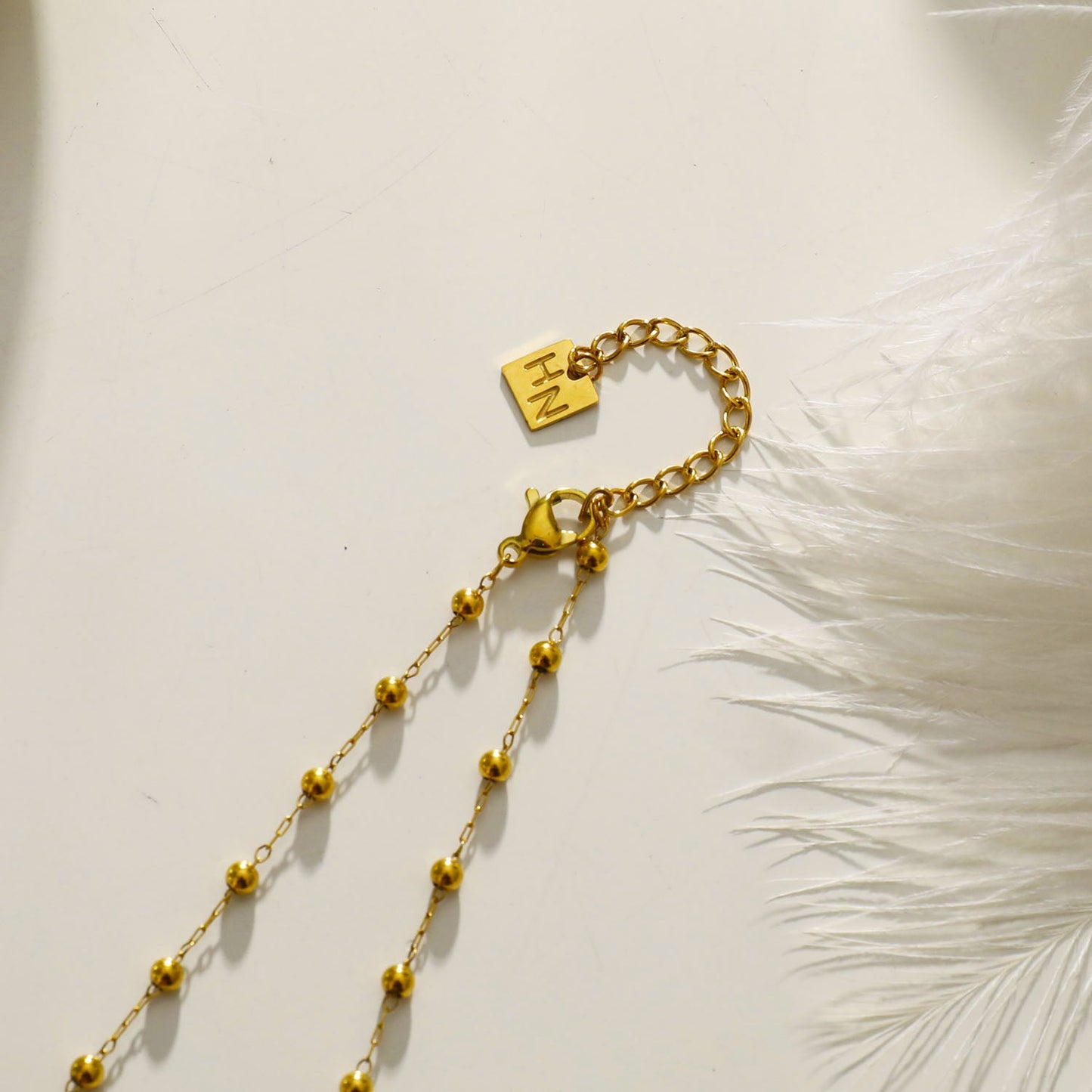 SANTA CRUZ Black: Gold & Black Onyx Beaded Chain Necklace