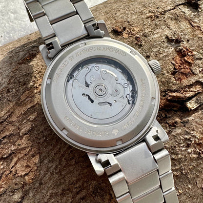 Montre Copernic en bois de noyer